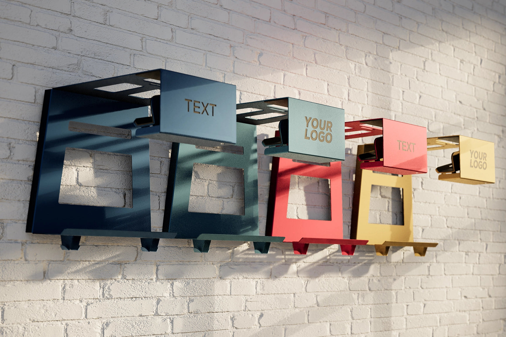 Customized Hold My Bike (HMB) bike wall mounts with customizable text and logo on a white brick wall – stylish indoor bike storage solutions for your home