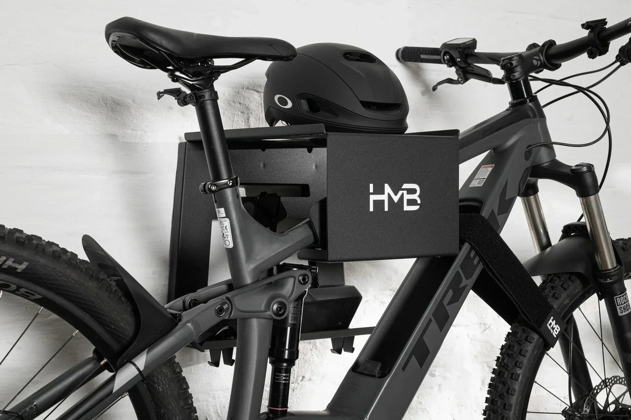 How to store an e-bike in a flat without wrecking your walls (or your back)