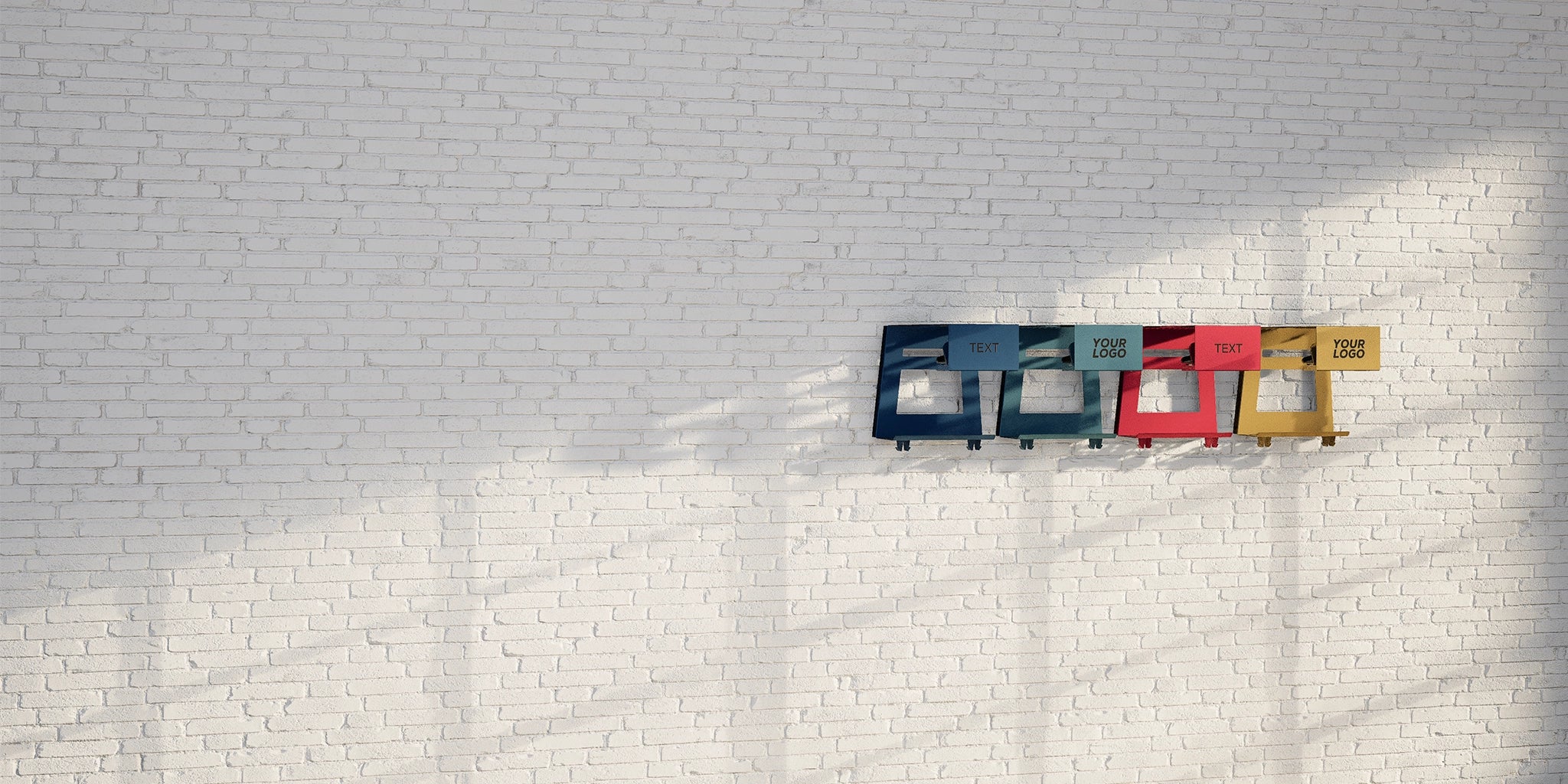 Customized Hold My Bike (HMB) bike wall mounts with customizable text and logo on a white brick wall – stylish indoor bike storage solutions for your home